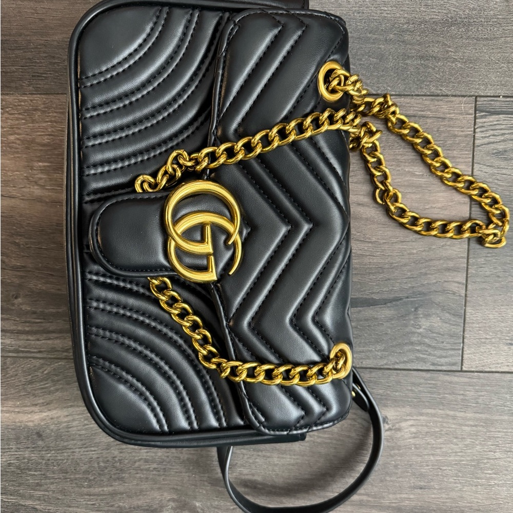 Elegant Black Quilted Bag with Gold Chain